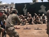 U.S Army trainers with Company A, 1st Battalion 502nd Infantry Regiment, Task Force Strike, demonstrate a room clearing technique at the request of the Iraqi ranger student leadership at Camp Taji, Iraq, July 18, 2016. Company A instruct at the Iraqi ranger training program as part of their building partner capacity and advise and assist mission. Camp Taji is one of four Combined Joint Task Force – Operation Inherent Resolve build partner capacity locations dedicated to training Iraqi security forces. (U.S. Army photo by 1st Lt. Daniel Johnson/Released)