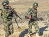 Soldiers from the Afghan National Army, 1st Brigade, 203rd Corps, carry elements of their 82mm mortar system during a live-fire exercise that marked the conclusion of a two-week mortarmen course at the Fires Center of Excellence, Camp Parsa, Afghanistan, Jan. 3, 2013. The FCOE, a school developed and mentored by Soldiers from 3rd Battalion, 320th Field Artillery Regiment, 3rd Brigade Combat Team “Rakkasans,” 101st Airborne Division (Air Assault), is designed to teach sustainable practices and methods that will allow the ANA to engage the enemy effectively with improved capabilities. (U.S. Army photo by 1st Lt. Bryan Spear, 3-320th FA, Unit Public Affairs Representative)