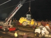 A crane had to be used to remove the front end loader from the top of the cab. (Photo by CPD-Jim Knoll)