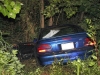 Ford Mustang went off an embankment after colliding with a Mazda Miata.  (Photo by CPD-Jim Knoll)