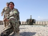 A soldier with the Afghanistan National Army\'s 4th Kandak, 1st Infantry Brigade, 203rd Afghan Army Corps, prepares to pull the firing cord on a Russian made D-30 122mm howitzer during a dry-run firing exercise as U.S. Army Master Sgt. Liviu Ivan, who hails from Gaithersburg, Md., and a D-30 howitzer subject matter expert with 3rd Battalion, 320th Field Artillery Regiment, 3rd Brigade Combat Team “Rakkasans,