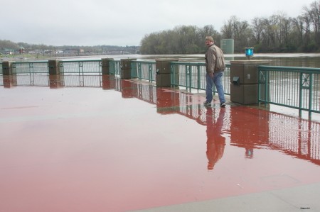 Mark Haynes walks along the top of the water covered terrace.