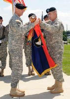 U.S. Army Command Sergeant Major (CSM) Scott Schroeder the division CSM and Major General John Campbell the Commanding General of the 101st Airborne Division (Air Assault) "Screaming Eagles" case the division colors during the casing ceremony outside of McAuliffe Hall at Fort Campbell, KY on 19 May 2010. U.S. Army Photo by Sam Shore