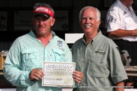 Kent Chapman (left) after being awarded the 150 HP Mercury Outboard Motor & $250 gift certificate