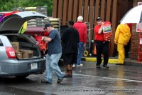 Wendy's employees load some of the perishable items into vehicles for relocation to other Wendy's locations