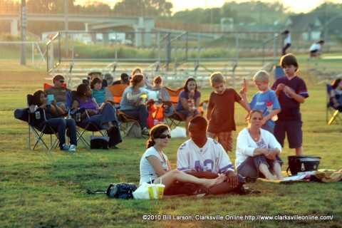 Families waiting for the movie to begin at Movies in the on Park.