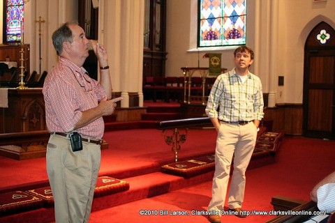 Architect Lyle Lane talks about elements of the roof at Trinity Episcopal Church while Tour Guide Josh Wright looks on