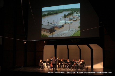The Gateway Chamber Ensemble playing Mozart to a slideshow of flood photos