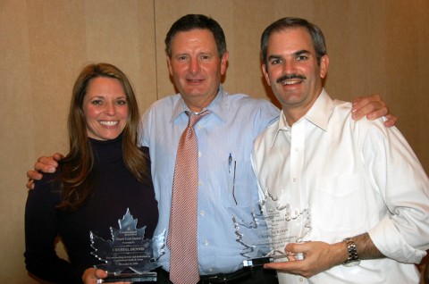 Crystal Dennis (left) and Charlie Koon (right) with Ron Sleigh (center) President / CEO of Cumberland Bank & Trust