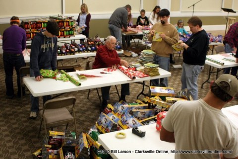 The wrapping of the gifts for the Kiwanis Club Children's Christmas Party