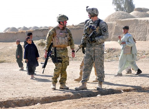 Flying Officer Stephen Milne, 51 Squadron Royal Air Force Regiment, officer commanding C flight (left) and Staff Sgt. Daniel Damschen, Task Force Saber Pathfinder squad leader (right) conduct a friendly patrol together during a key leader engagement mission in Kandahar province, Afghanistan, Nov. 16th. (Photo by Sgt. 1st Class Sadie Bleistein) Flying Officer Stephen Milne, 51 Squadron Royal Air Force Regiment, officer commanding C flight (left) and Staff Sgt. Daniel Damschen, Task Force Saber Pathfinder squad leader (right) conduct a friendly patrol together during a key leader engagement mission in Kandahar province, Afghanistan, Nov. 16th. (Photo by Sgt. 1st Class Sadie Bleistein)
