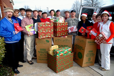 Pictured loading gifts for delivery to Fort Campbell are: Joey Bynum, Jermaine Haltom, Mark Proctor, Bill Coleman, Chris Bick, Art Helf, Martin Zorn, Doug Rogers, SGT Glen Strickler, Mike Sapp, SFC Nick Guilbeau, Teresa Welbeck, Beth Brown, Brenda Williamson, and Mary Lankford Benson. Pictured loading gifts for delivery to Fort Campbell are: Joey Bynum, Jermaine Haltom, Mark Proctor, Bill Coleman, Chris Bick, Art Helf, Martin Zorn, Doug Rogers, SGT Glen Strickler, Mike Sapp, SFC Nick Guilbeau, Teresa Welbeck, Beth Brown, Brenda Williamson, and Mary Lankford Benson.