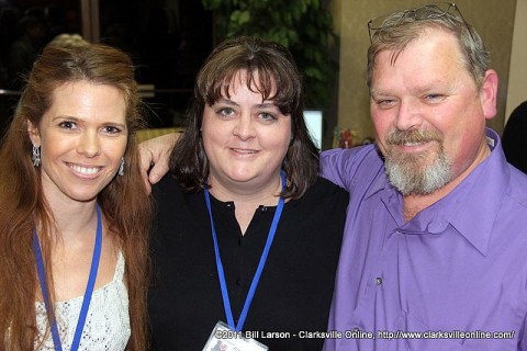 Tina Hartman (left) and George Hartman (right) with Amy Shaver (center)