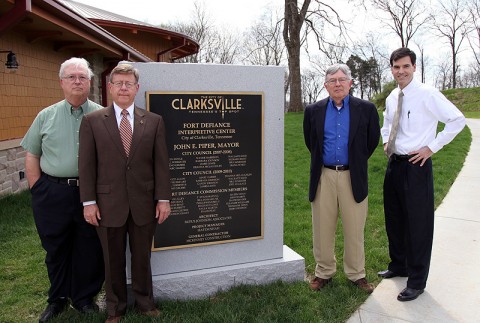 Austin Peay State University professors Richard Gildrie (retired), Phil Kemmerly, Howard Winn (retired) and David Snyder stand next to a monument with their names engraved on it at the city’s new Fort Defiance Interpretive Center. (Photo By Charles Booth/APSU Public Relations and Marketing)