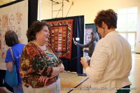 Visitors to Quits of the Cumberland talk about their favorite quilts