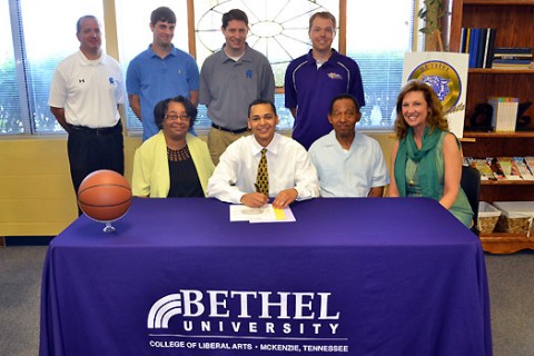 Travis Russell signs Basketball Scholarship with Bethel University