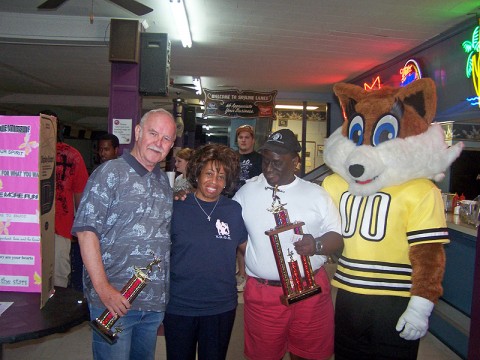 (Left to Right) 2nd Place winner Walt Telfer, Reverend Rita Ewing, 1st Place winner Fabian Merriweather and "Trixy" the Clarksville Fox-Women's football teams mascot.