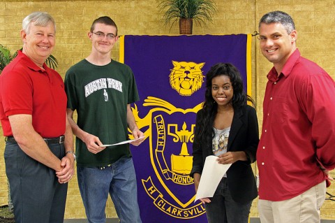 Bill Summers (left) presents scholarship certificates to Austin Pitts and Alexis Bynum as CHS Spanish teacher and HOPE Club advisor Danny Magrans looks on.