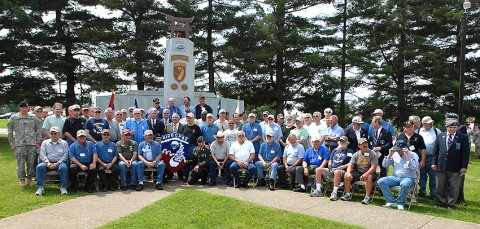 Veterans of the 3rd Brigade Combat Team, 101st Airborne Division gather at a memorial dedicated to fallen Soldiers of the 187th Infantry Regiment.