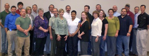 Pictured from left to right are: Back Row: Troy Owens, Brad Butler, Tom Caldwell, Kevin Van Aken, Tim Campbell, Joel Justice, Tim Swaw, Greg Haupt, Orville Sykes, Ron Smithfield, Front Row: Joe Woodard, Jim Hyde, Katie Gambill, Mary Jackson, Len Stolz, Jan Greene, Monika Wilford, Kim Clarkson, Lynn Stokes, Anne Stehle, Michelle Mann, Lee Castillo, and John Brooks. Not pictured: Lavon Bracey, Clint Camp, Larry Carpenter, and Charlie Foust.