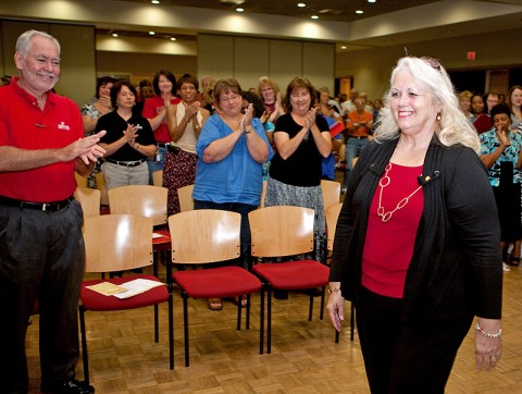 Donna Liverett (right) receives a standing ovation as she is honored for her 40 years of service in the APSU Department of Chemistry during an employee service awards reception July 22nd at Austin Peay State University. (Photo by Beth Liggett, APSU Photographer)