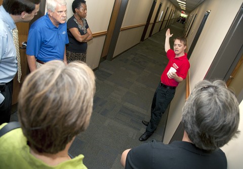Hall Director Marcus Brown leads a tour of Austin Peay State University's newest residence hall, Castle Heights, following a grand opening ceremony on Thursday, August 11th.