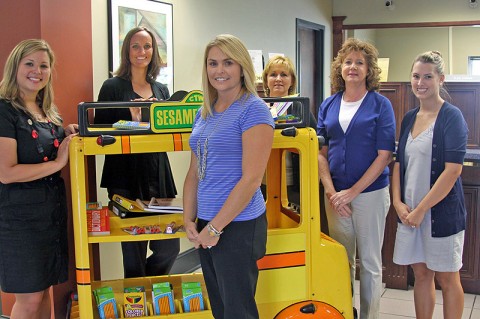 Legends Bank staff (from left) Britney Campbell, Liz Pritts, Angie Jackson, Melinda Schwallie, Lisa Roberts and Heather Erickson presented $400.00 and between 400 and 500 individual school supplies to support the Clarksville Montgomery County Education Foundation's Teachers Warehouse.