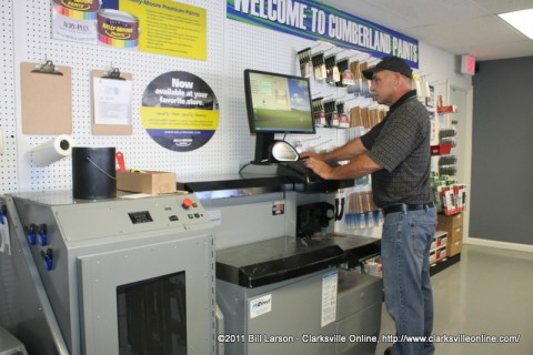 Cumberland Paints and Supply Owner Brian Caudle mixing up a batch of zero VOC paint.