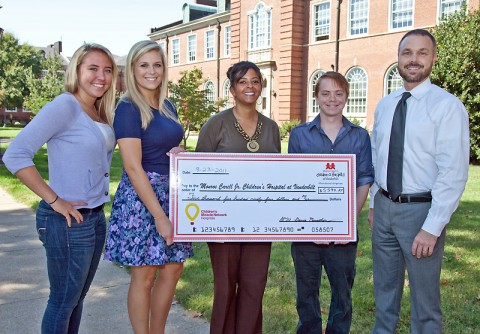 Pictured (from left) are Molly Silkowski, recruitment coordinator; Aubrey Harris, student director; Dawn Blache, representative with the Monroe Carell Jr. Children's Hospital at Vanderbilt; Marcus Brown, student director; and Victor Felts, director of Student Life and Leadership at APSU. (Photo by Beth Liggett, APSU photographer)