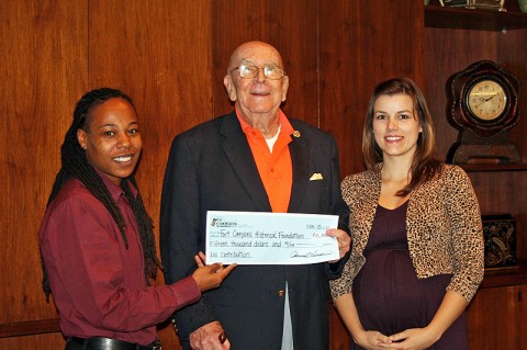Fort Campbell Historical Foundation check was accepted by Col Ted Crozier (R). From L to R: Channel Lemon (Race Director), Col Ted Crozier (R), Jessica Goldberg (Race Director).