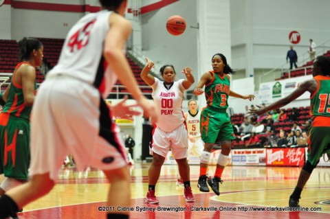 Jasmine Rayner passes the ball to Meghan Bussabarger during the Lady Govs loss to Florida A&M Tuesday night. Bussabarger scored her season's first double-double, a career high 21 points and 11 rebounds. Jasmine Rayner passes the ball to Meghan Bussabarger during the Lady Govs loss to Florida A&M Tuesday night. Bussabarger scored her season's first double-double, a career high 21 points and 11 rebounds.