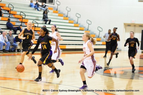 Clarksville High School Lady Wildcats get out on a fast break during their 56-34 win over the Lawrence County Lady Wildcats.