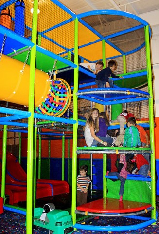 Children enjoying the multi-level play scape.