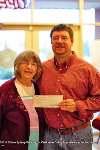 Michael Clark, winner of the Lasaters Christmas Giveaway, and his mother, Jeane Clark, just after receiving the $1000 giveaway.
