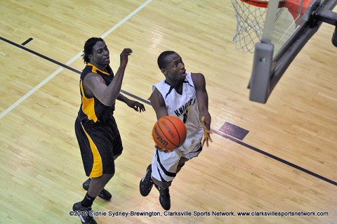 Kenwood's Trent McLaurin goes up for a fancy two-pointer. In the second match-up of the season, the Knights held on longer than they did their first time around, but still felll to the Eagles 61-48. Kenwood's Trent McLaurin goes up for a fancy two-pointer. In the second match-up of the season, the Knights held on longer than they did their first time around, but still felll to the Eagles 61-48.