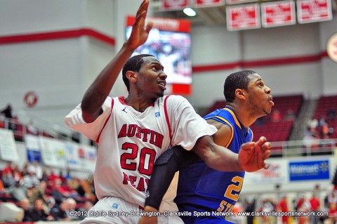 Melvin Baker positions himself under the goal during the Austin Peay Governors 52-48 loss to the Morehead State Eagles Wednesday night. Baker was the Governors leading scorer with 17 points. Melvin Baker positions himself under the goal during the Austin Peay Governors 52-48 loss to the Morehead State Eagles Wednesday night. Baker was the Governors leading scorer with 17 points.