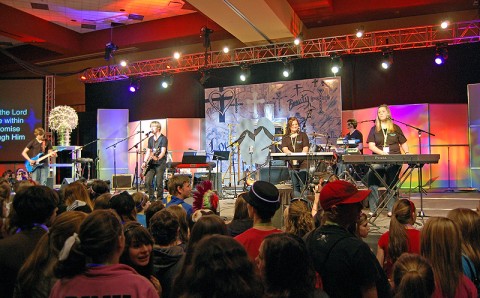 Members of the Marked Praise Band (from left, Zach Pine, Webb Booth, Myndi Leazer, Austin Robertson and Ally Robertson) perform in front of more 2,000 participants at the Warmth in Winter youth ministry conference held Jan. 28th in Murfreesboro, TN. (Photo by Melony Shemberger)