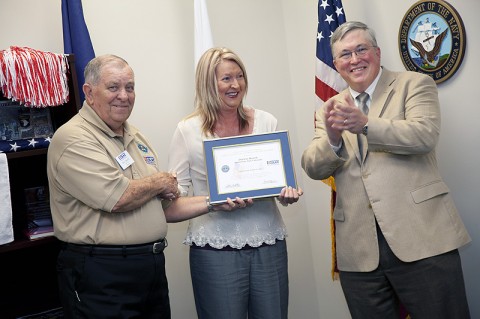 Bob Beaty, with Employer Support of the Guard and Reserve, presents Darlene Howell, coordinator of APSU Military Student Center, with the Patriot Award while APSU President Tim Hall congratulates her. (Photo by Beth Liggett/APSU Staff)