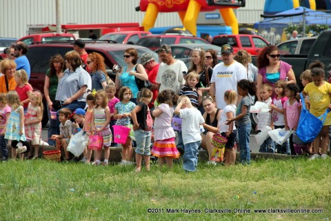 Children await the signal to begin at last year's Easter Egg hunt at Hilltop Supermarket.