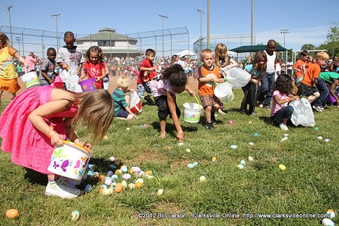 Kids gathering Easter eggs at the 2012 Spring Eggstravanganza on Saturday