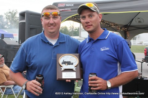 (L to R) Rusty Harris and Brian Richardson from Ideal Distributing with their trophy.