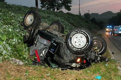 1997 Jeep Wrangler went off the road and down an emabankment off Peachers Mill Road Sunday Morning. (Photo by CPD-Officer Melissa Spielhagen) 1997 Jeep Wrangler went off the road and down an emabankment off Peachers Mill Road Sunday Morning. (Photo by CPD-Officer Melissa Spielhagen)