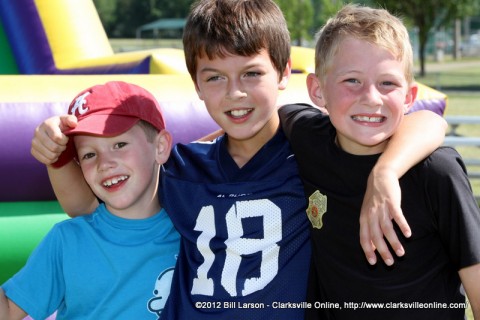 Three boys having a really good time at the Warrior Week Picnic