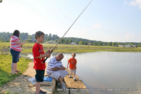 Some young fishermen getting ready to try their luck at the Liberty Park pond.