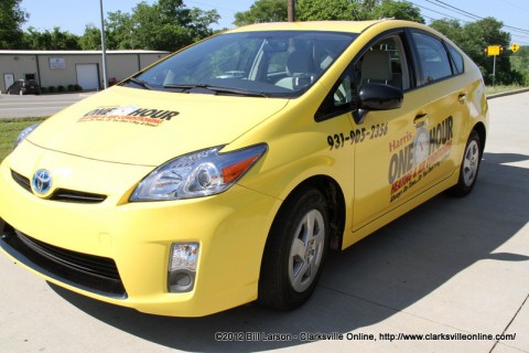 Harris One Hour Heating and Air Conditioning tradeed their F-150 business truck for the small hybrid Toyota Prius car.