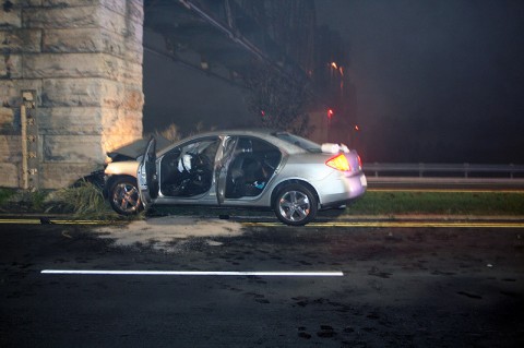 Pontiac G-6 runs into rail road bridge abutment near Crossland Avenue. (Photo by Officer Bill Van Beber-CPD) Pontiac G-6 runs into rail road bridge abutment near Crossland Avenue. (Photo by Officer Bill Van Beber-CPD)