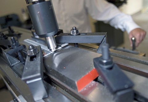 Dr. William “Russ” Longhurst demonstrates friction stir welding on a milling machine in the APSU Hemlock Semiconductor Building. (Photo by Beth Liggett/APSU staff)