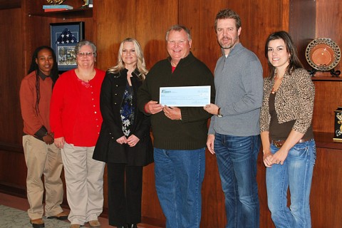 Fort Campbell Historical Foundation check was accepted by Robert Nichols. From L to R: Channel (Race Director), Susan, Nita, Robert (FCHF), Jim Manning (CDE Lightband) and Jessica Goldberg (Race Director). 
