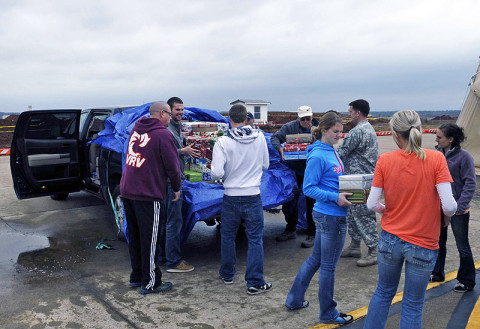 Members of the Friendship Christian Reform Church unload gift boxes during a gift drop to deployed members of the 160th Special Operations Aviation Regiment during a visit to the General Brown compound December 7th at Fort Campbell, KY. (160th SOAR (A) courtesy photo) Members of the Friendship Christian Reform Church unload gift boxes during a gift drop to deployed members of the 160th Special Operations Aviation Regiment during a visit to the General Brown compound December 7th at Fort Campbell, KY. (160th SOAR (A) courtesy photo)
