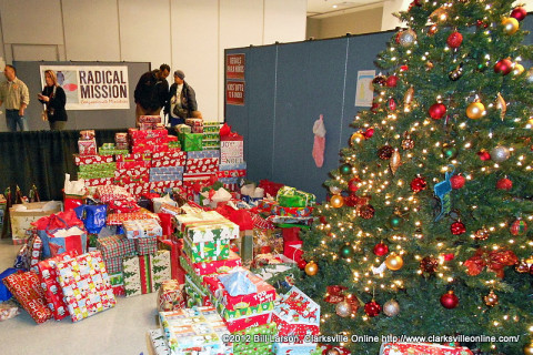 Christmas presents flowed out from under the Christmas Tree at the Radical Mission "Warm Souls Christmas Celebration" held last Christmas eve.